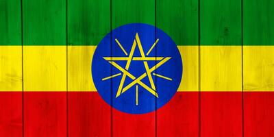 Flag of Federal Democratic Republic of Ethiopia on a textured background. Concept collage. photo