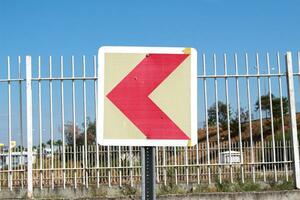 a red and white sign photo