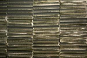 stack of laser cut steel billets - closeup texture and background photo