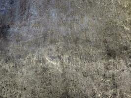 scratched beaten steel surface of workbench - texture and flat full-frame background photo