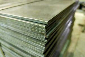 Cold rolled steel sheets stack corner, close-up photo