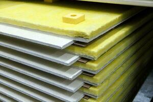 insulated dry wall sheets packs stack in home improvement store photo