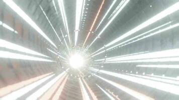 une en mouvement vidéo de une faisceau de lumière en voyageant à la vitesse dans une grand, futuriste acier tunnel. video