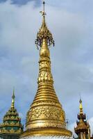 Exterior of the Shwedagon Pagoda a Golden Pagoda in Yangon, Rangoon, Myanmar, Asia photo