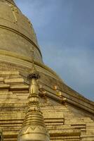 Exterior of the Shwedagon Pagoda a Golden Pagoda in Yangon, Rangoon, Myanmar, Asia photo