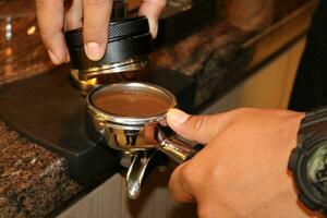 Barista is preparing roaster coffee photo