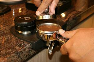 Barista is preparing roaster coffee photo