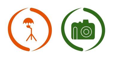 umbrella stand and dslr camera Icon vector