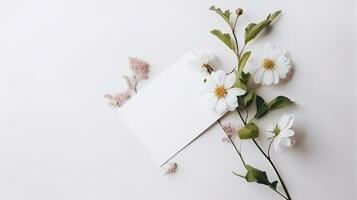 Top view blank card with flowers Abstract organic flowers Blooming floral on white background photo