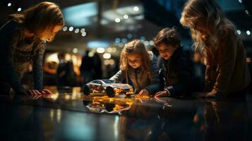 Children playing with a toy at night in the city. Robotics programming class. photo