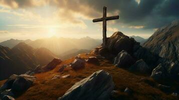 a cross on a mountain with the sun shining on it photo