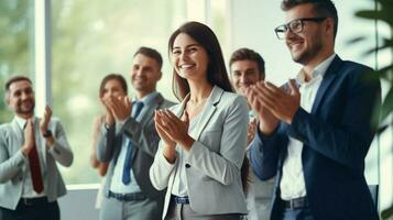 a successful business team presenting smiling and applaud photo