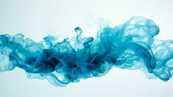 blue ink wave flowing underwater creating smoke photo