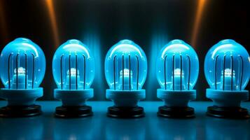 electric mixer knobs in a row illuminated blue photo