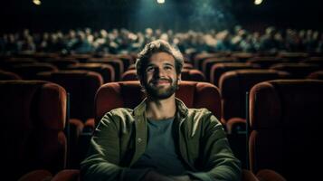 man watching movie in theater seats spectacle photo