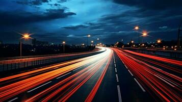 nighttime traffic blurs along dark multiple lane highway photo