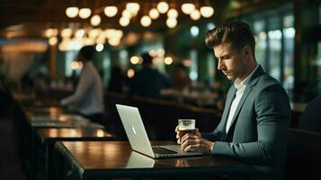 one businessman working on laptop in coffee shop photo