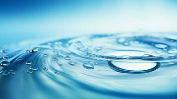 shiny raindrop on abstract blue water surface photo