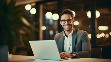 smiling businessman indoors looking at camera working on photo