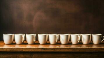 stack of coffee cups in a row on table no people photo