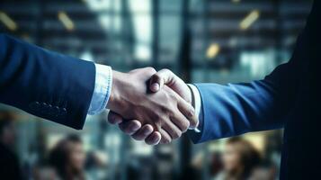 successful businessmen in suits shaking hands in corporate photo