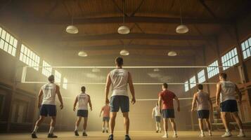 team of adult men playing competitive volleyball indoors photo