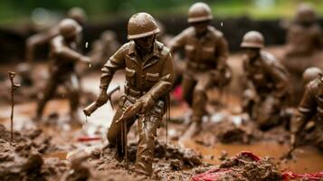 toy soldiers in mud aiming for victory photo
