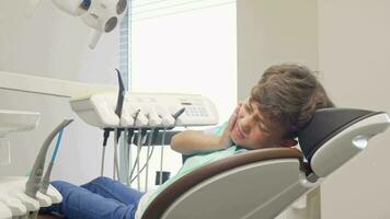 Little boy with toothache looking desperately to the camera video