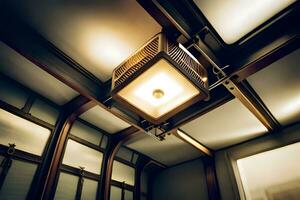 a light fixture hangs from the ceiling of a room. AI-Generated photo