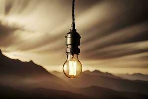a light bulb hanging from a rope in front of a mountain range. AI-Generated photo