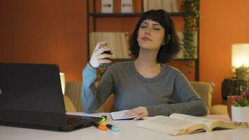 A Female student spraying perfume. video