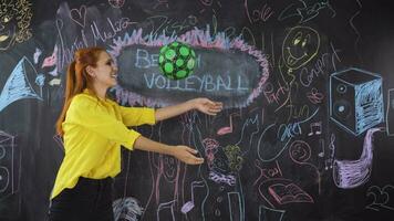 Young woman doing Beach Volleyball on blackboard. video