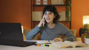 Female student getting good news on the phone. video