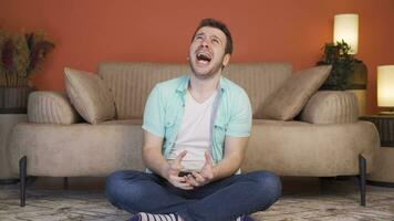 Man having a nervous breakdown is messing around at home. video