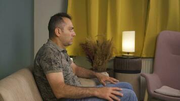 Fearful man. He is in a bad mood at home. video