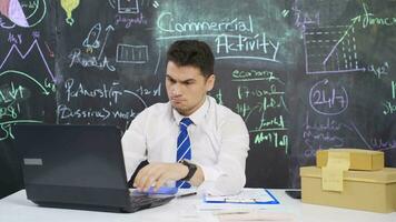 Businessman writes Business Activity on blackboard and feels thoughtful. video