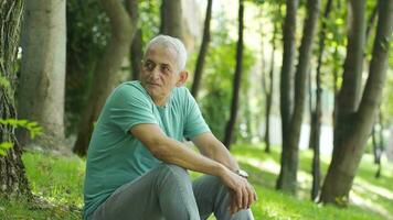 Schizophrenic and depressed man looking around in open field. video
