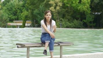 Depressed and thoughtful woman sitting on the floor. video