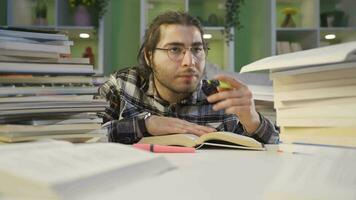 Close-up of college student studying at lecture. video