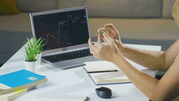 Woman examining bitcoin. video