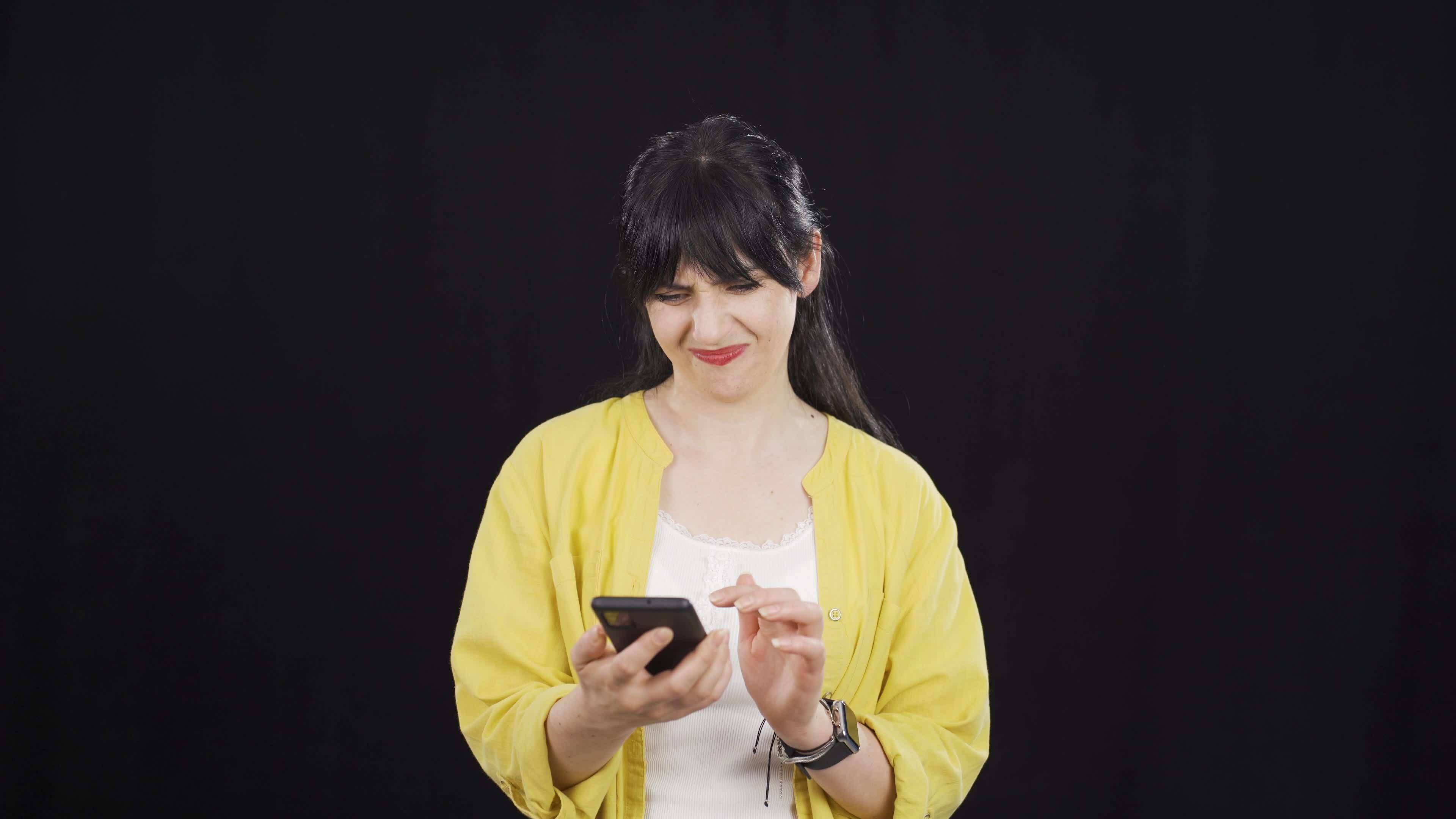 The phone of the woman talking on the phone runs out of charge