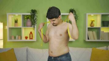 Excess weight, belly. Person playing with his belly. video