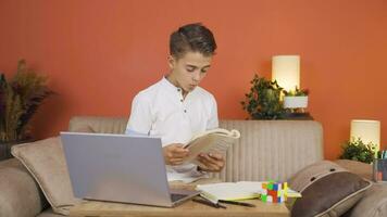 The boy is very happy to read books. video