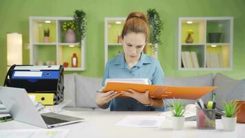 Business woman angry with files gets angry. video