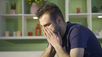 Young man thinking thoughtfully depressed. video