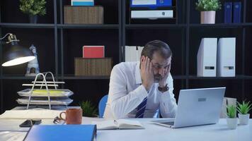 Office worker gets angry and angry as soon as he works on laptop. video