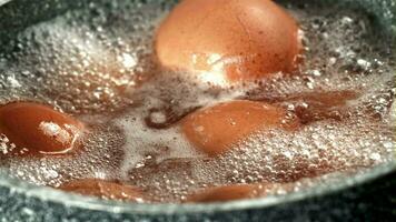 Eggs are boiled in a saucepan. Filmed on a highspeed camera at 1000 fps. High quality FullHD footage video