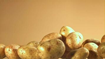 Potatoes fly up and fall down. Filmed on a highspeed camera at 1000 fps. High quality FullHD footage video