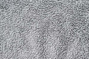 Gray wool rug texture background photo