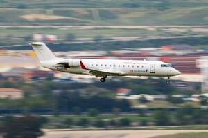 Iberia Airlines passenger plane at airport. Schedule flight travel. Aviation and aircraft. Air transport. Global international transportation. Fly and flying. photo